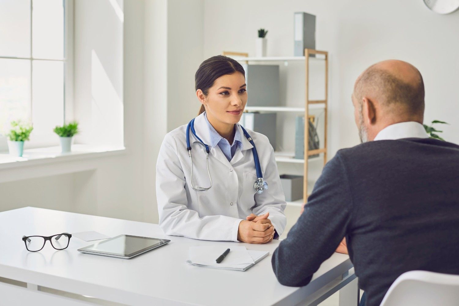 Doctor Consulting A Patient In An Albanian Clinic