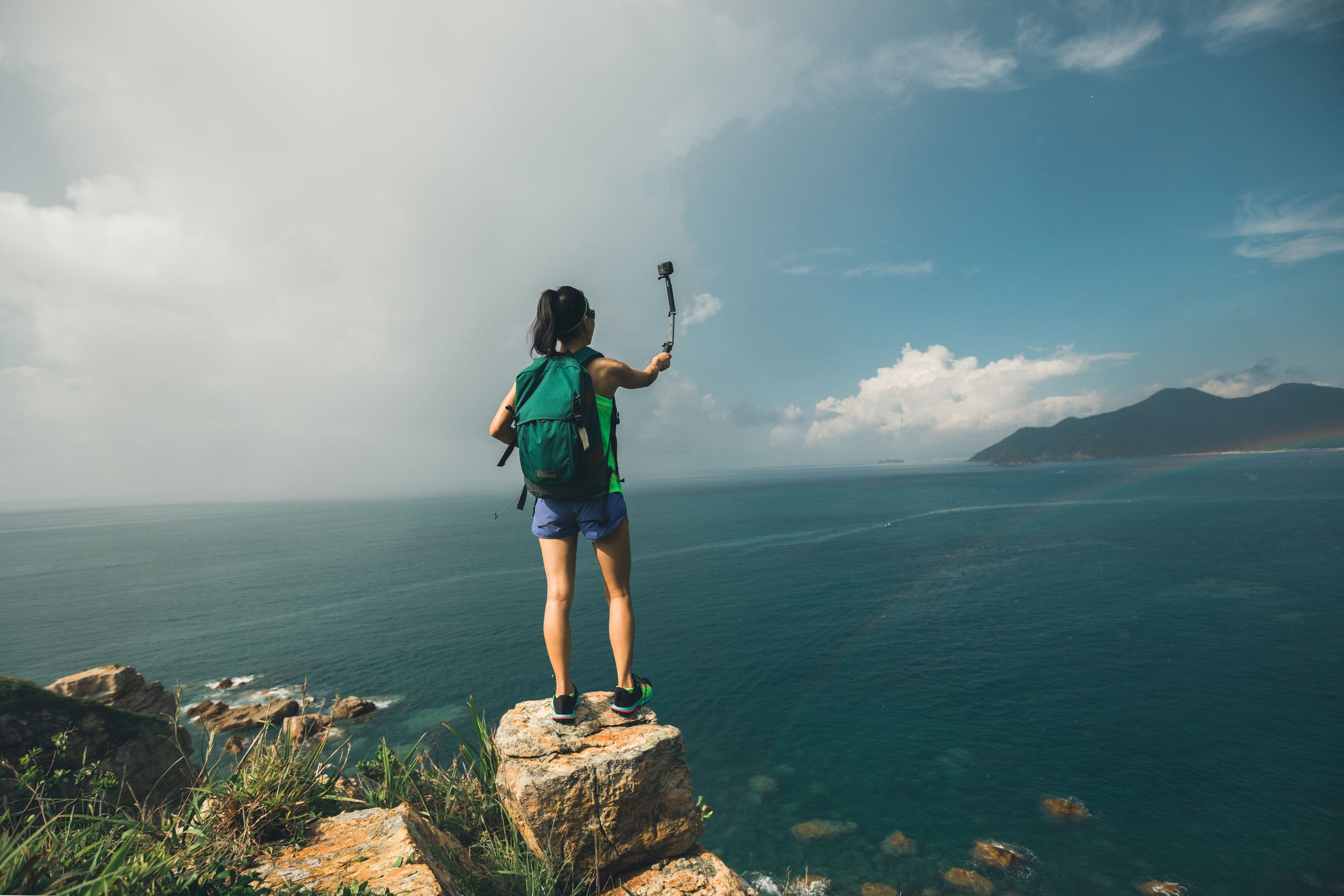 Hiker Taking Selfie On Cliffside